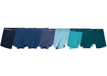 Set of men's underwear in various colors on a light gray background