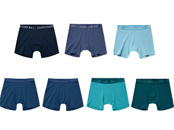 Set of men's underwear in various colors on a light gray background