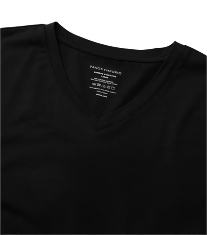 Black t-shirt with Panos label on a light gray background